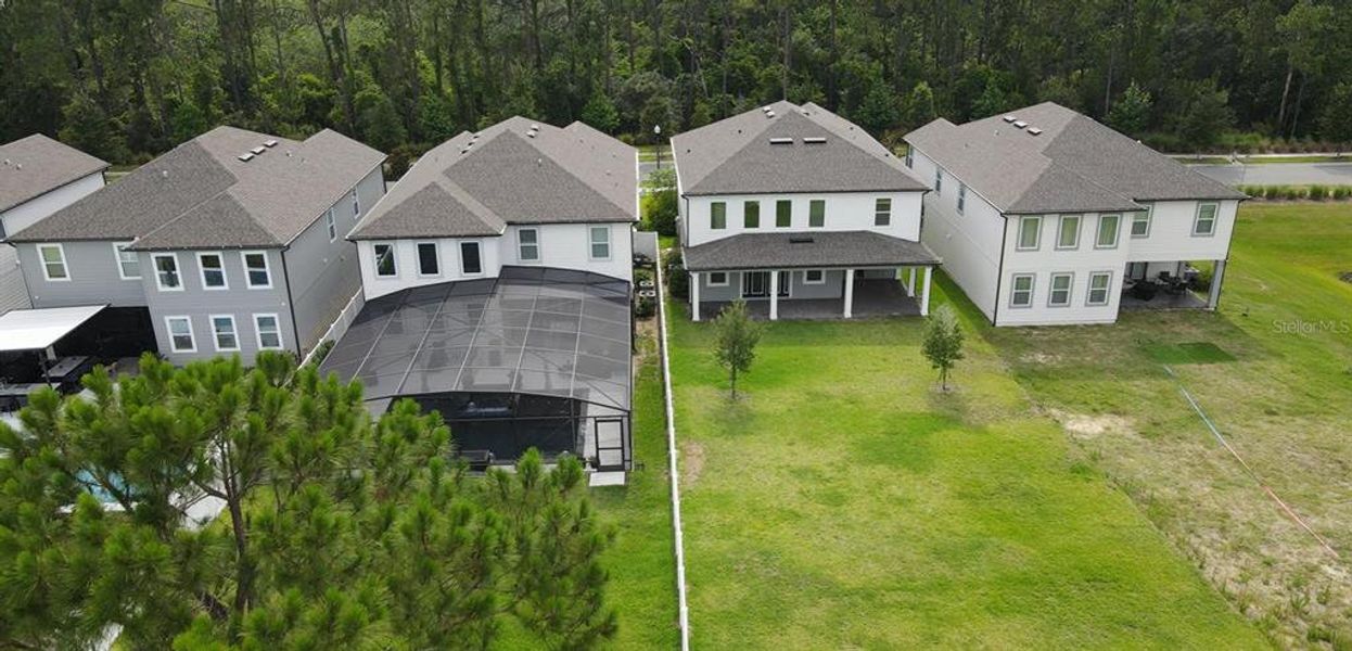 Front exterior of a new home in , Winter Garden, FL, highlighting curb appeal (Image 2). Front exterior of a new home in , Winter Garden, FL, highlighting curb appeal (Image 2).