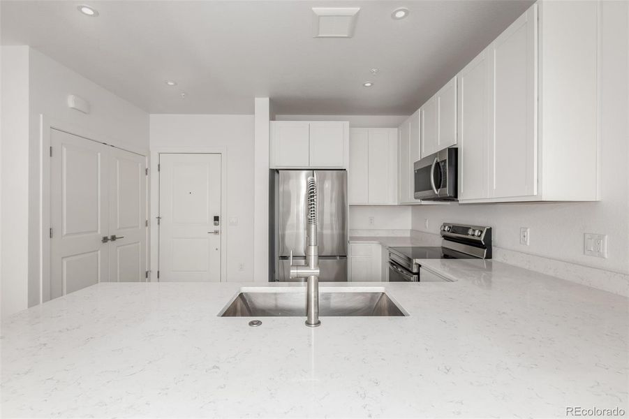 Furnished interior view inside a new home in The Scene at Sloan's Lake, Denver (Image 7).