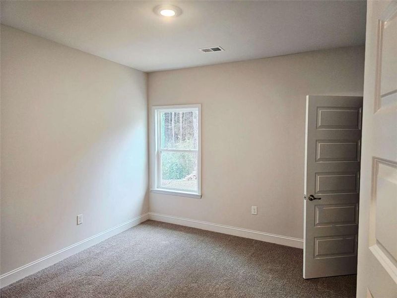 Spacious, unfurnished interior of a new home in Scarlett Place, Bowdon (Image 10). Spacious, unfurnished interior of a new home in Scarlett Place, Bowdon (Image 10).