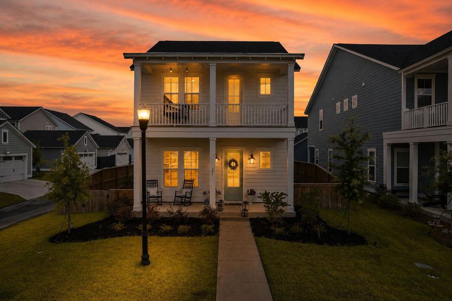 Front exterior of a new home in Carnes Crossroads, Summerville, SC, highlighting curb appeal (Image 1). Front exterior of a new home in Carnes Crossroads, Summerville, SC, highlighting curb appeal (Image 1).