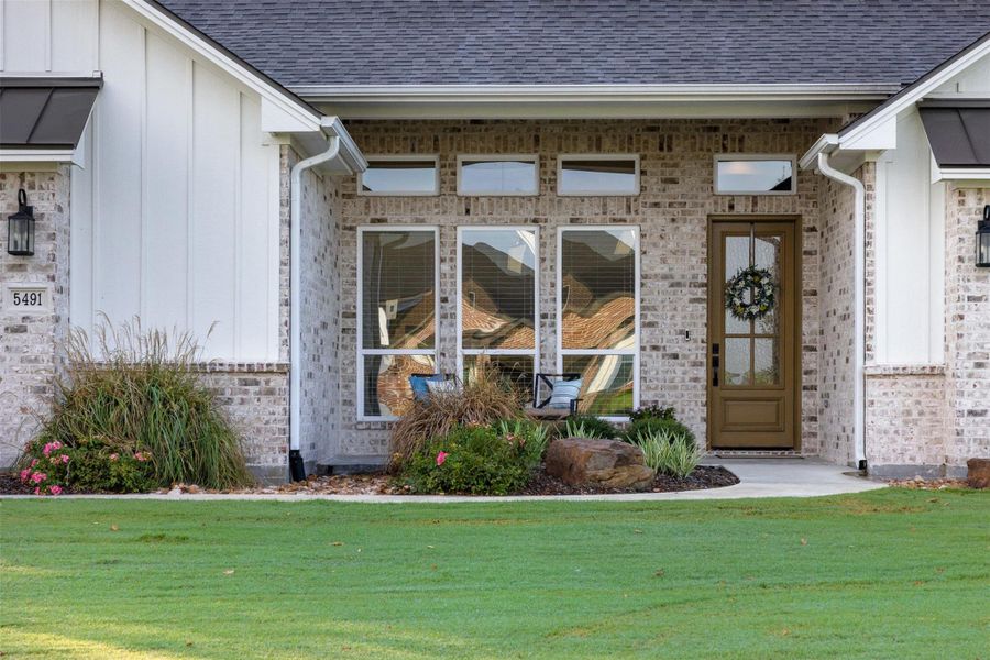 Front exterior of a new home in , College Station, TX, highlighting curb appeal (Image 21).