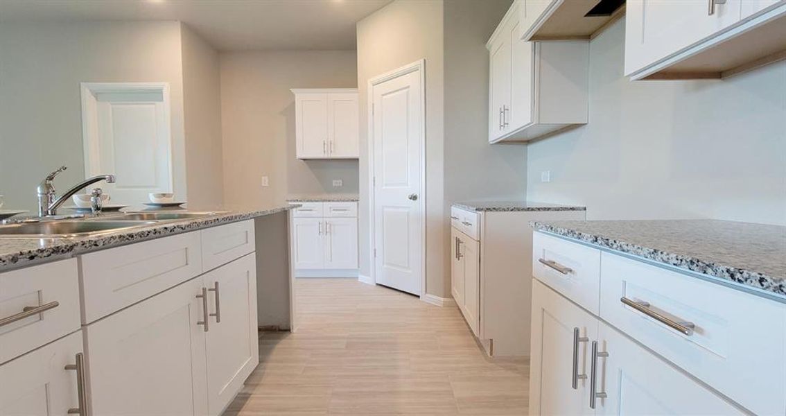Furnished interior view inside a new home in Highlands at Chapel Creek, Fort Worth (Image 6). Furnished interior view inside a new home in Highlands at Chapel Creek, Fort Worth (Image 6).
