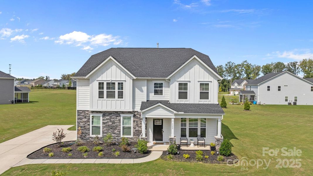 Front exterior of a new home in , Indian Trail, NC, highlighting curb appeal (Image 22).