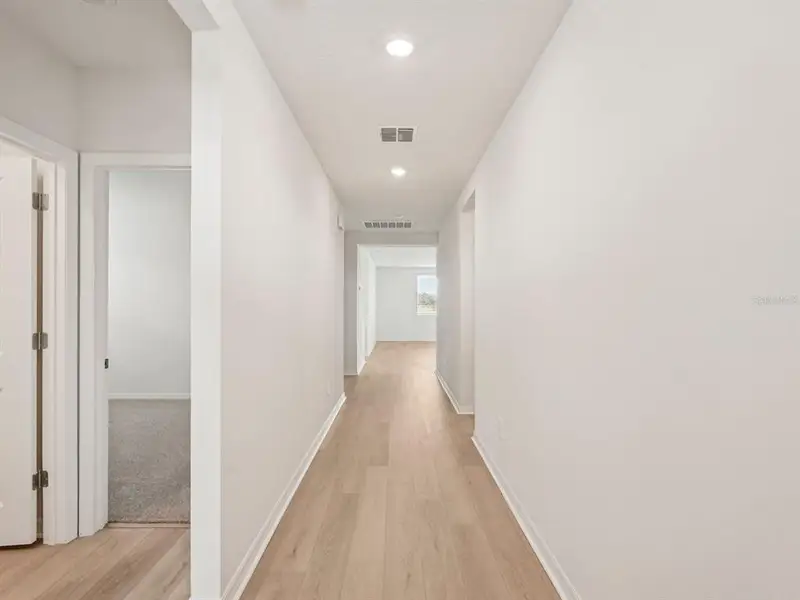 Spacious, unfurnished interior of a new home in Oakfield Trails - Classic Series, Parrish (Image 5). Spacious, unfurnished interior of a new home in Oakfield Trails - Classic Series, Parrish (Image 5).