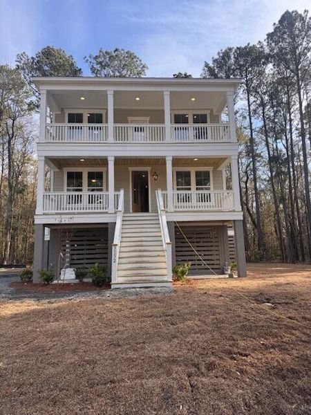 Exterior details and patio area of a home in Waterloo Estates, Johns Island (Image 11).