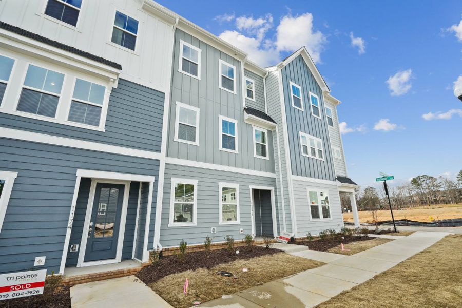 Representative exterior photo of a completed home built from the Holden by Tri Pointe Homes in Mews at Holding Village, Wake Forest, NC (Image 2).