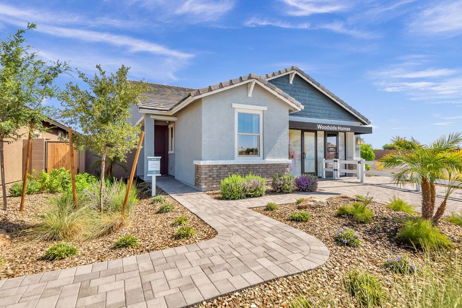 Front exterior of a new home in Icon at Thunderbird, Glendale, AZ, highlighting curb appeal (Image 29). Front exterior of a new home in Icon at Thunderbird, Glendale, AZ, highlighting curb appeal (Image 29).