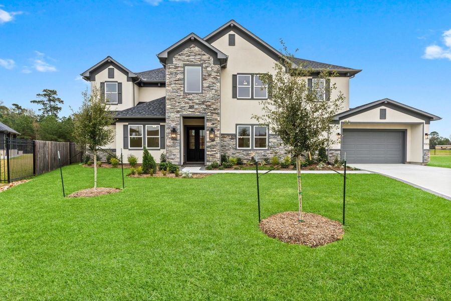 Front exterior of a new home in , Spring, TX, highlighting curb appeal (Image 2). Front exterior of a new home in , Spring, TX, highlighting curb appeal (Image 2).