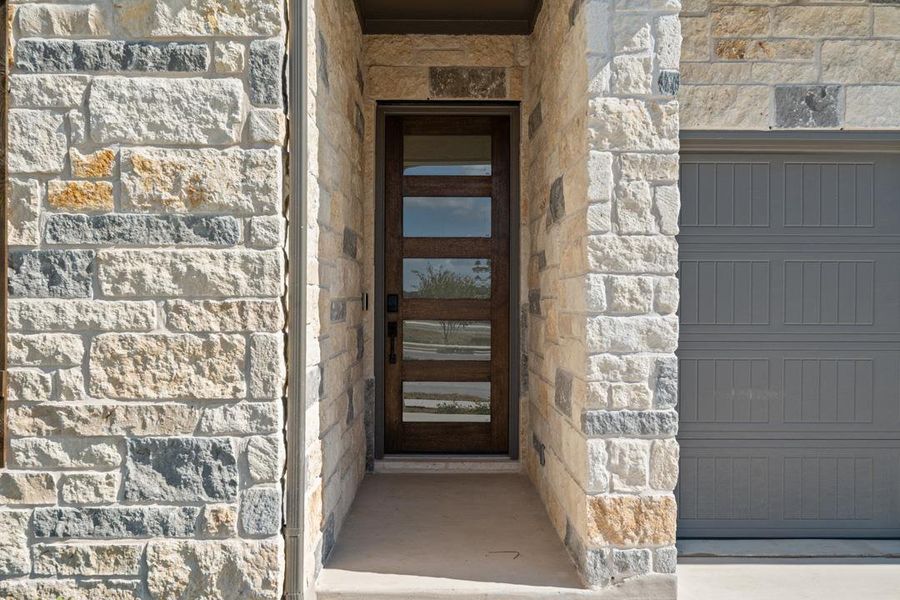 Exterior details and patio area of a home in Arbor Collection at Heritage, Dripping Springs (Image 24). Exterior details and patio area of a home in Arbor Collection at Heritage, Dripping Springs (Image 24).