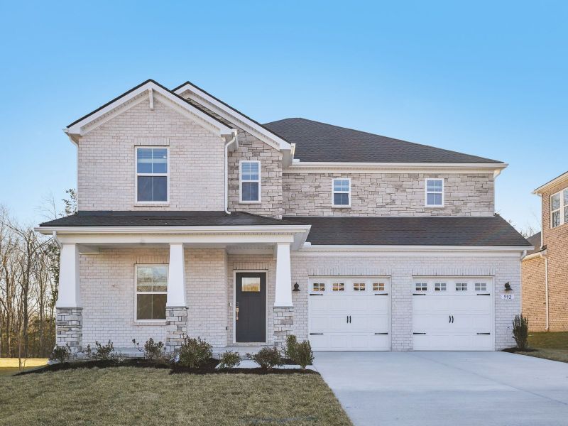 Front exterior of a new home in Benders Cove - Reserve Series, Mount Juliet, TN, highlighting curb appeal (Image 1). Front exterior of a new home in Benders Cove - Reserve Series, Mount Juliet, TN, highlighting curb appeal (Image 1).