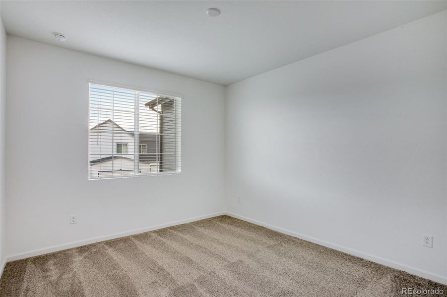 Spacious, unfurnished interior of a new home in Westside Crossing Townhomes, Berthoud (Image 23).