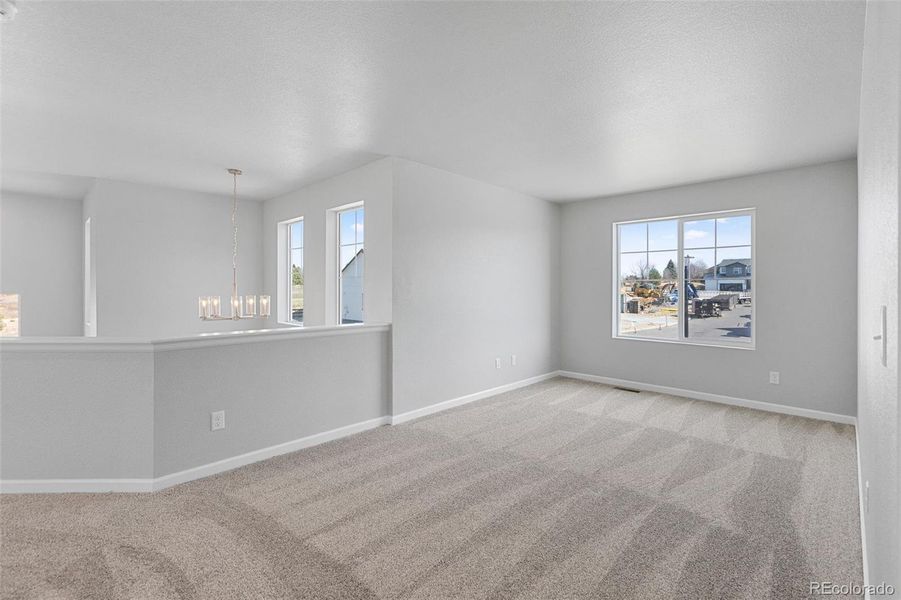 Spacious, unfurnished interior of a new home in Highlands Preserve, Mead (Image 18).