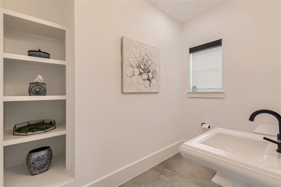 Powder Room located off the Foyer