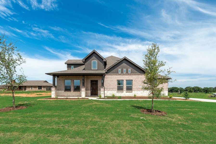 Front exterior of a new home in , Whitesboro, TX, highlighting curb appeal (Image 20).