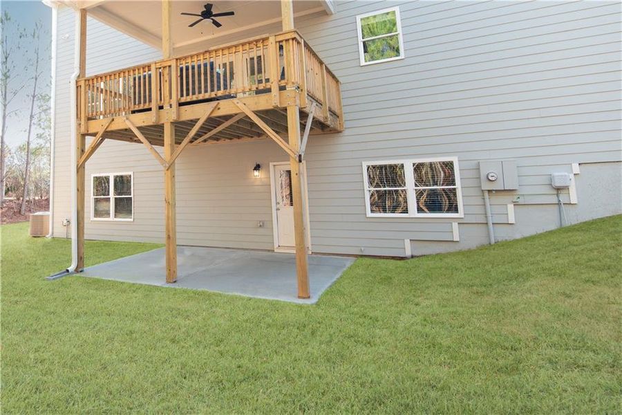 Exterior details and patio area of a home in The Estates at Hurricane Pointe, Douglasville (Image 26).