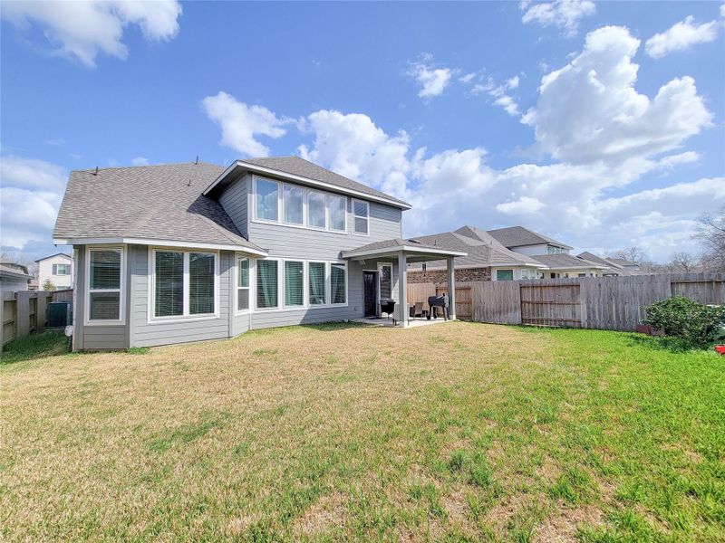 Exterior details and patio area of a home in Creekside Farms, Richmond (Image 4).