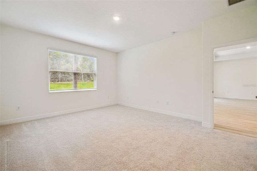 Spacious, unfurnished interior of a new home in Hidden Ridge, New Port Richey (Image 33).