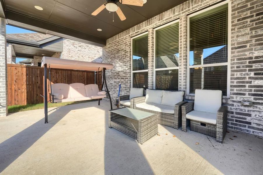 View of patio / terrace featuring ceiling fan and an outdoor hangout area