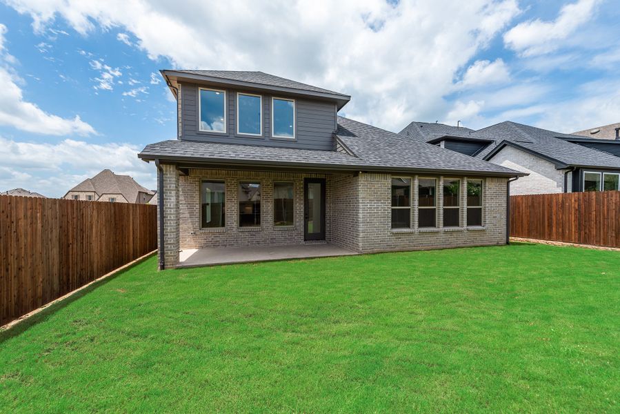 Exterior details and patio area of a home in Tavolo Park, Fort Worth (Image 4).