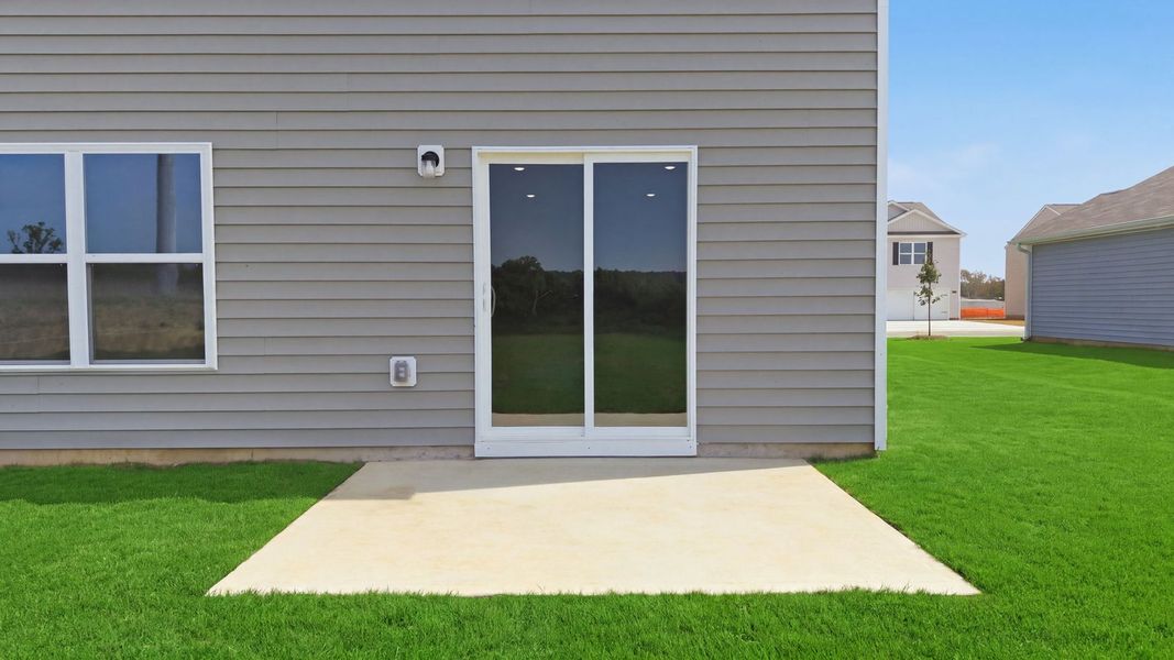 Exterior details and patio area of a home in Bynum Farms, Farmville (Image 24). Exterior details and patio area of a home in Bynum Farms, Farmville (Image 24).