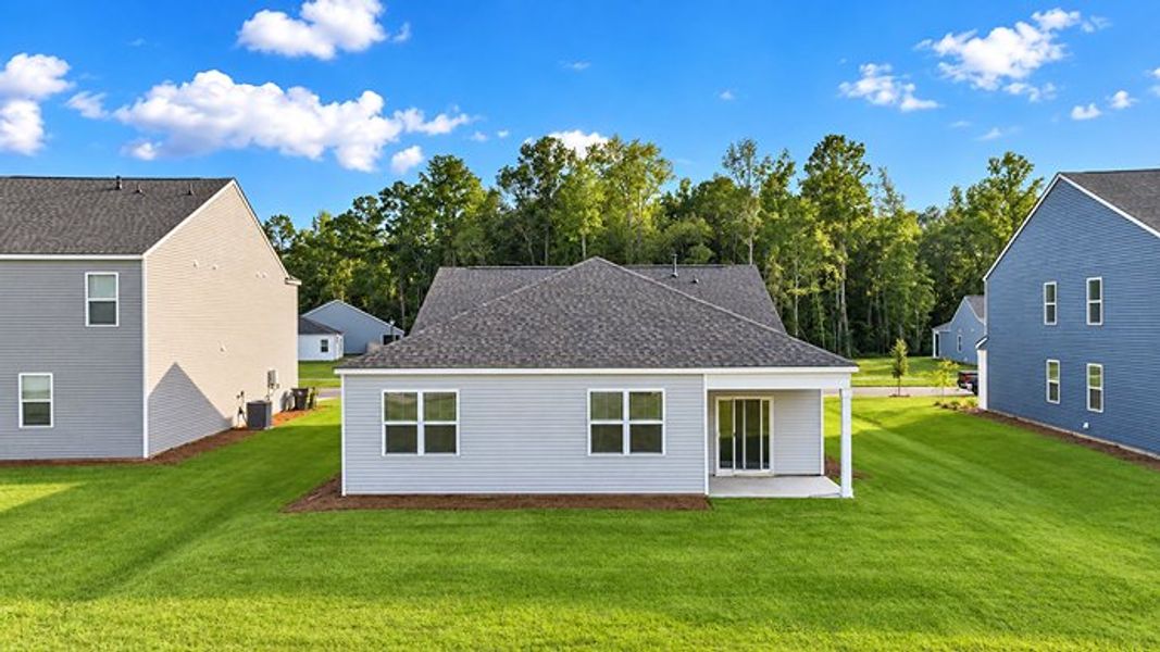 Exterior details and patio area of a home in Pine Hills at Cane Bay, Summerville (Image 3).