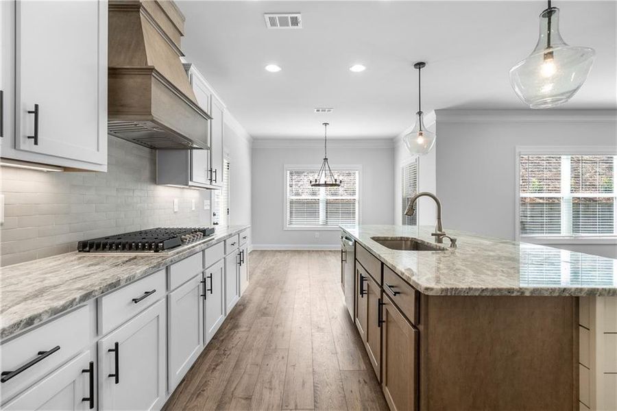 Furnished interior view inside a new home in Calgary Downs, Winder (Image 11).