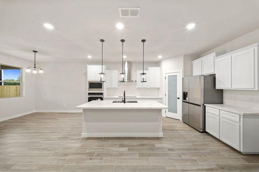 Furnished interior view inside a new home in Alberta Heights, Edinburg (Image 7).