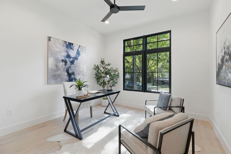Home office with ceiling fan, light wood-style floors, and recessed lighting
