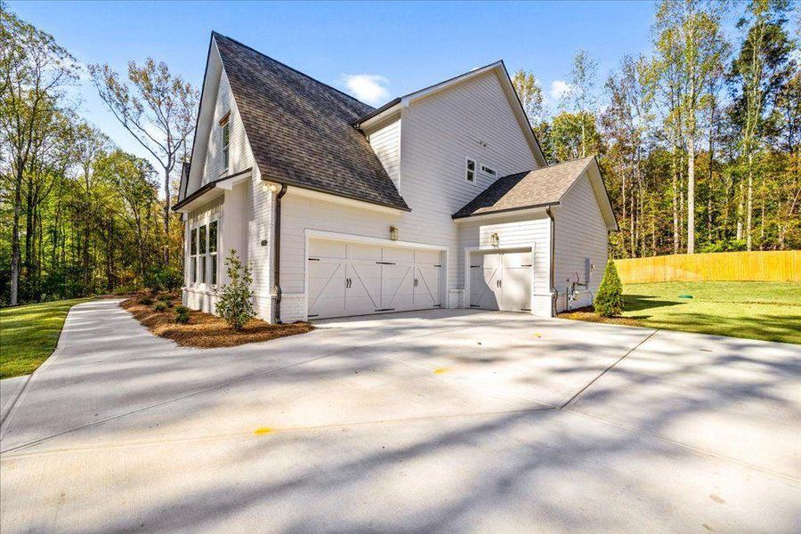 Front exterior of a new home in , Gainesville, GA, highlighting curb appeal (Image 20).