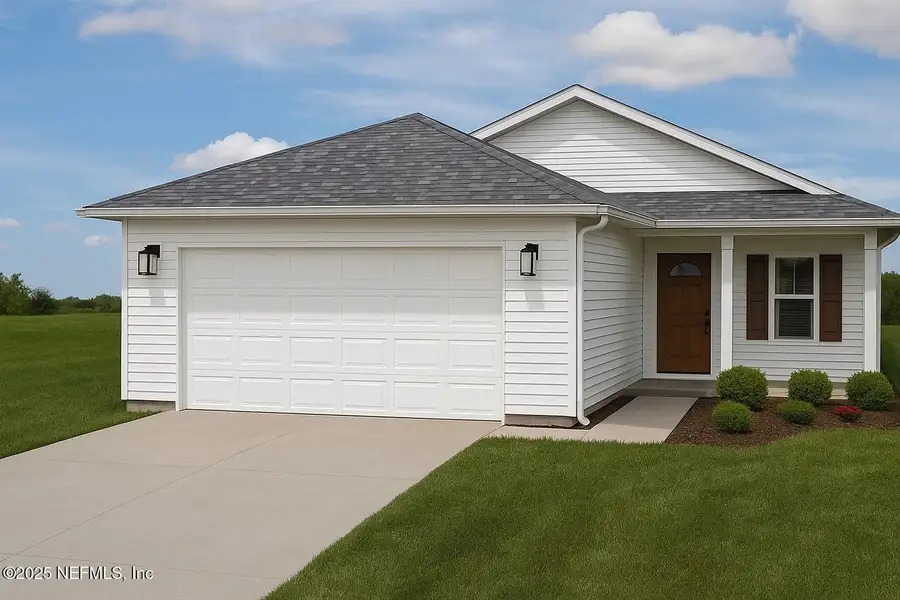 Front exterior of a new home in , Satsuma, FL, highlighting curb appeal (Image 1).