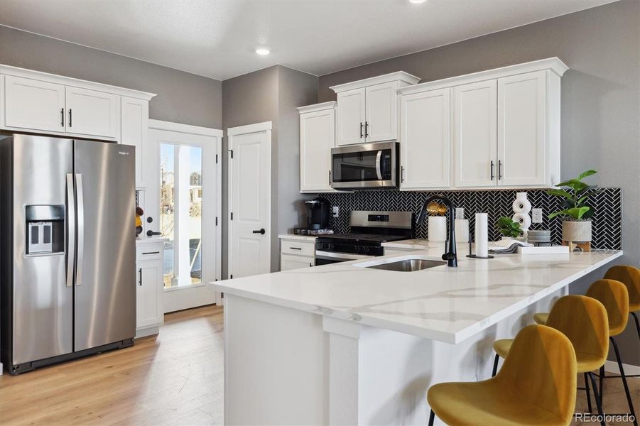 Furnished interior view inside a new home in Horizon Uptown, Aurora (Image 13).