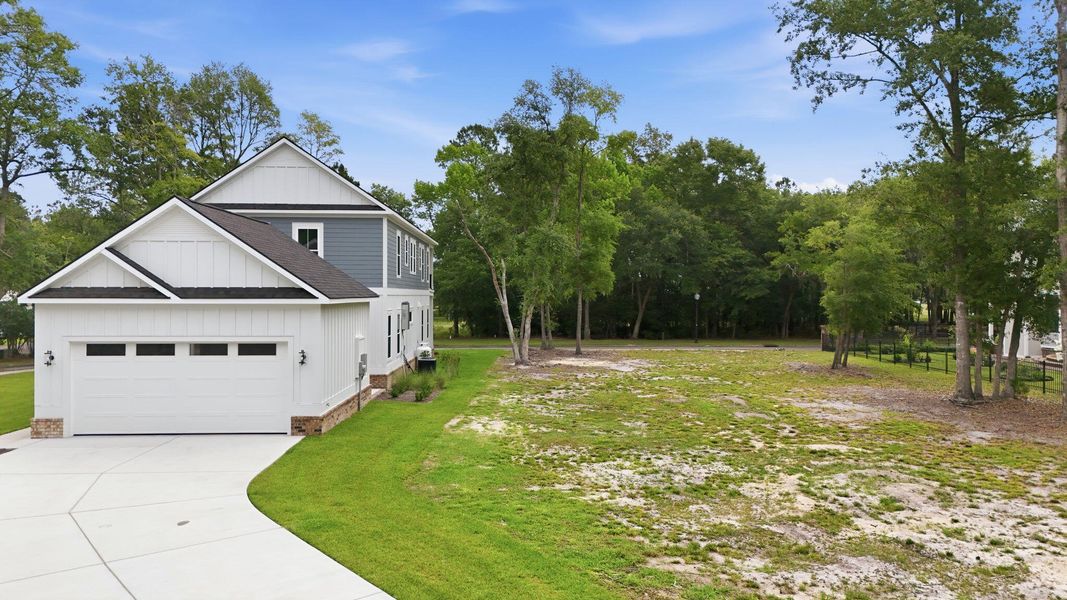 Front exterior of a new home in , Georgetown, SC, highlighting curb appeal (Image 2). Front exterior of a new home in , Georgetown, SC, highlighting curb appeal (Image 2).