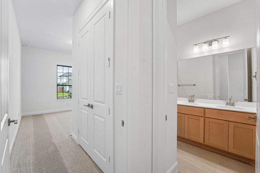 Furnished interior view inside a new home in Del Bello Lakes 60', Manvel (Image 13).