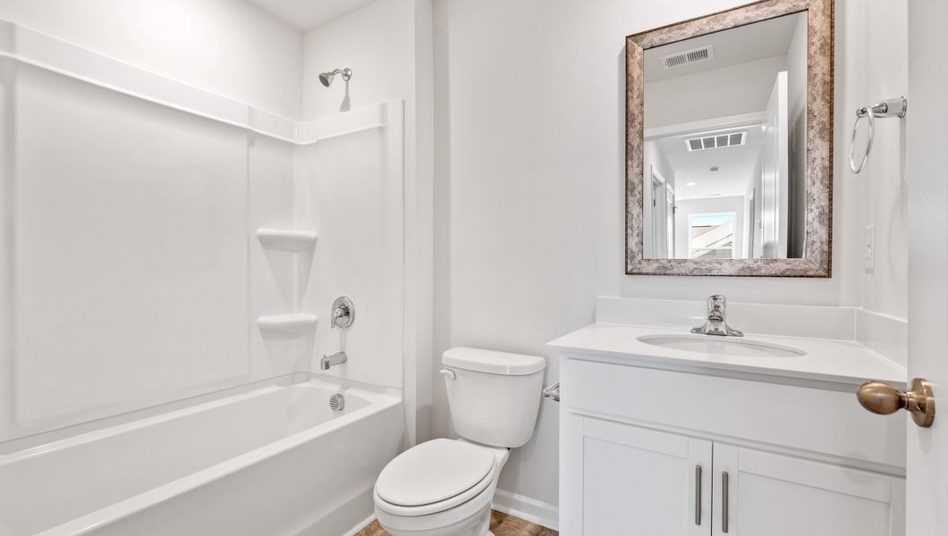 Furnished interior view inside a new home in Harper Ridge, Roebuck (Image 10).