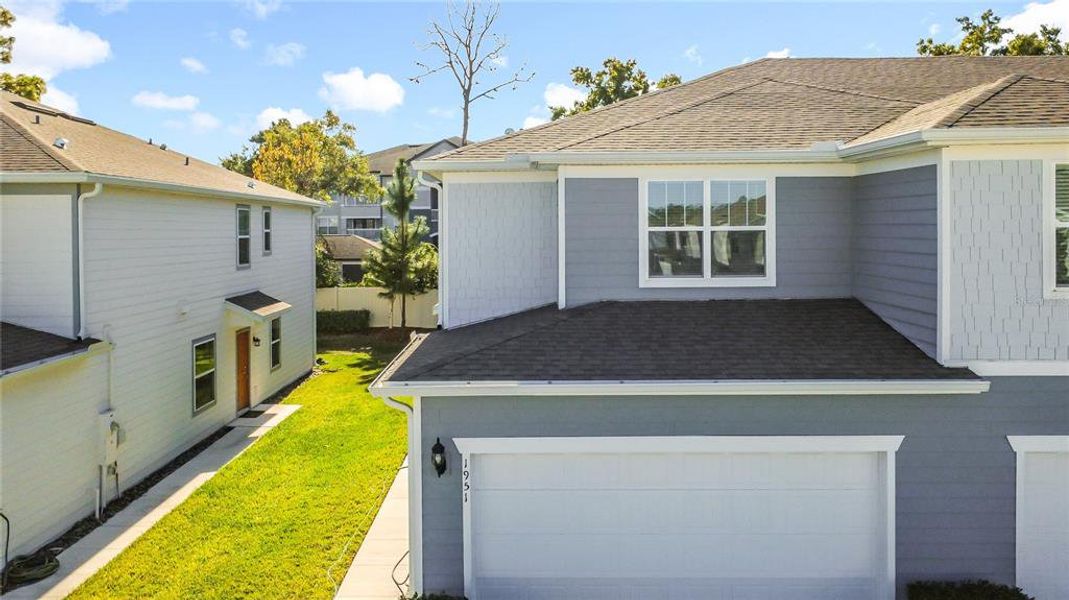 Front exterior of a new home in , Winter Park, FL, highlighting curb appeal (Image 30). Front exterior of a new home in , Winter Park, FL, highlighting curb appeal (Image 30).