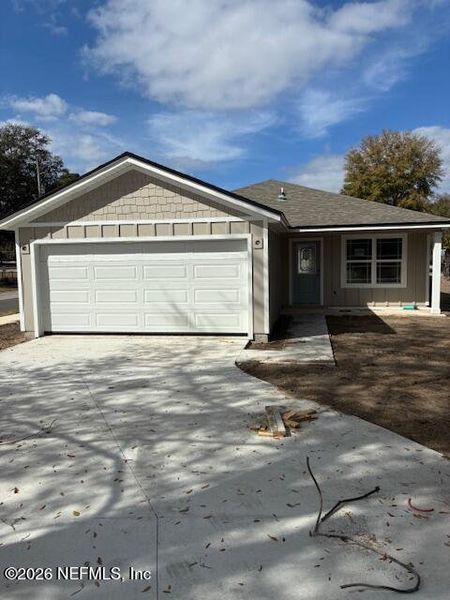Front exterior of a new home in , Green Cove Springs, FL, highlighting curb appeal (Image 1). Front exterior of a new home in , Green Cove Springs, FL, highlighting curb appeal (Image 1).