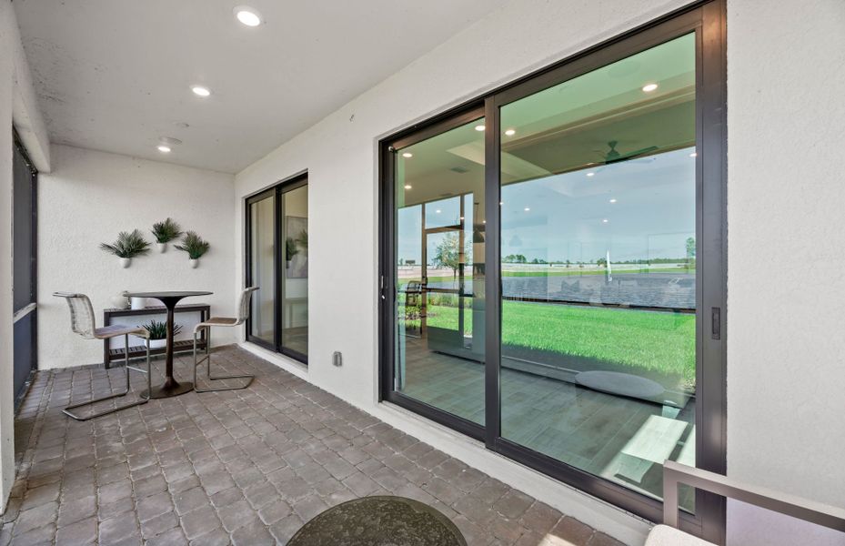 Exterior details and patio area of a home in Arbor Oaks, North Port (Image 3). Exterior details and patio area of a home in Arbor Oaks, North Port (Image 3).