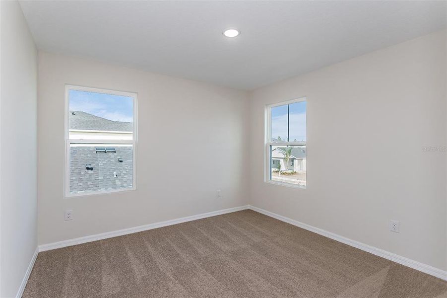 Spacious, unfurnished interior of a new home in Scenic Terrace, Haines City (Image 41).