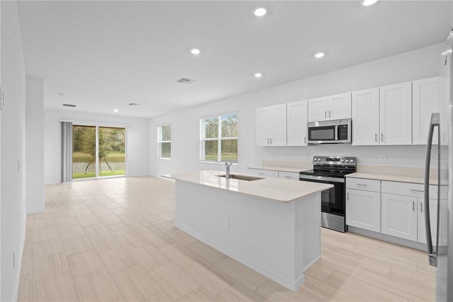 Furnished interior view inside a new home in Angeline, Land O' Lakes (Image 11).