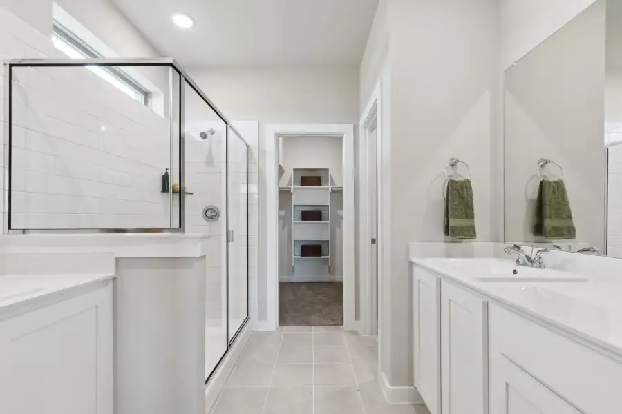 Primary Bathroom in the Magnolia home plan by Trophy Signature Homes – REPRESENTATIVE PHOTO Primary Bathroom in the Magnolia home plan by Trophy Signature Homes – REPRESENTATIVE PHOTO
