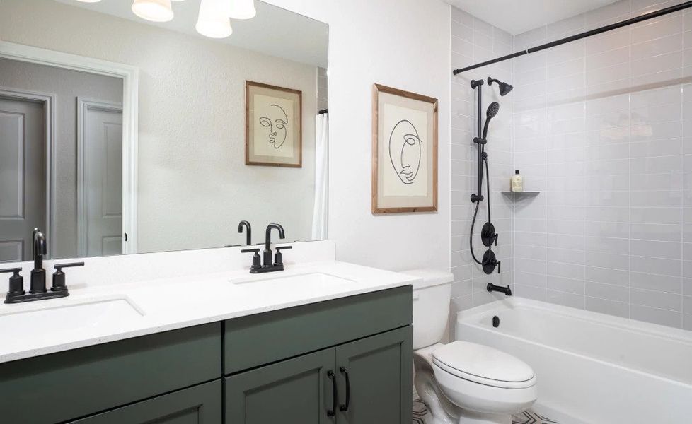 Representative furnished interior of a home built from the Winchester by Ashton Woods in The Trails at Carmel, Pflugerville (Image 14).