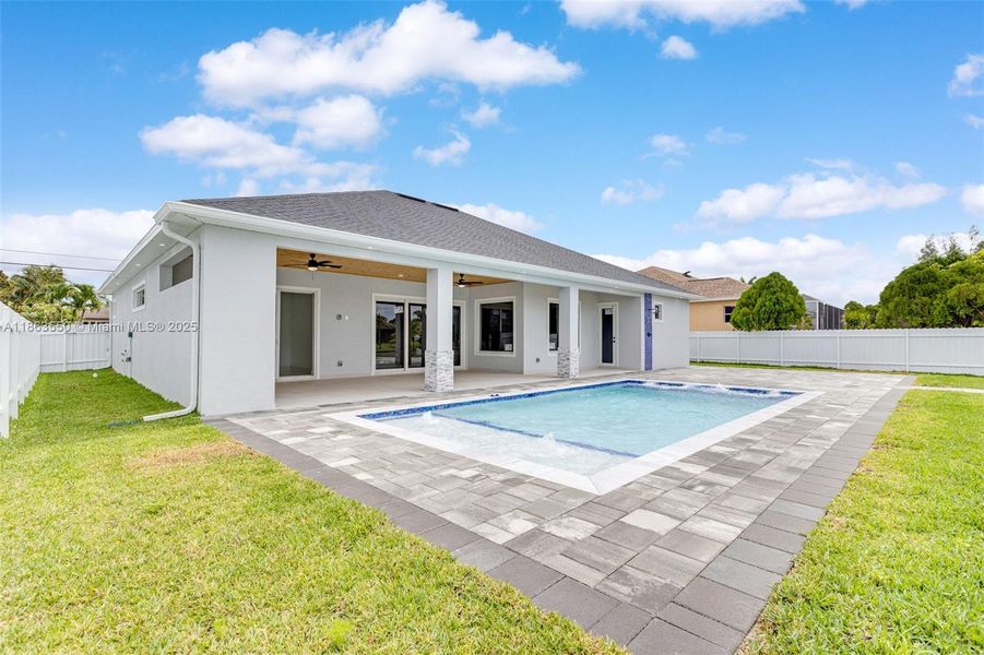 Front exterior of a new home in , Cape Coral, FL, highlighting curb appeal (Image 34). Front exterior of a new home in , Cape Coral, FL, highlighting curb appeal (Image 34).