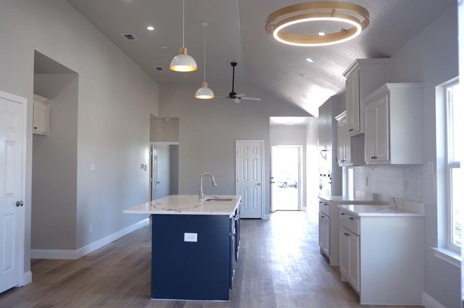 Dinner area and kitchen Dinner area and kitchen