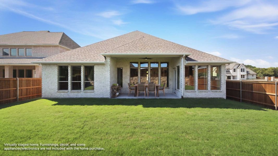 Exterior details and patio area of a home in Mustang Lakes, Celina (Image 2). Exterior details and patio area of a home in Mustang Lakes, Celina (Image 2).