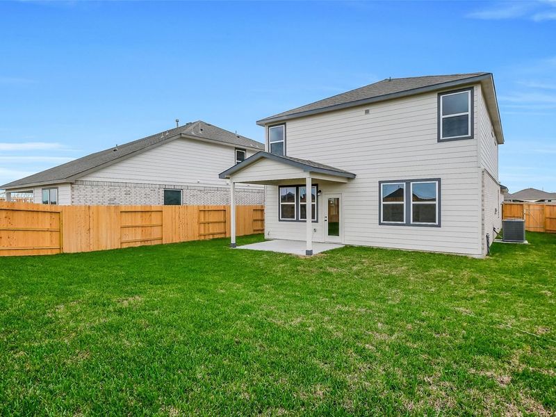Exterior details and patio area of a home in Emberly, Beasley (Image 26).