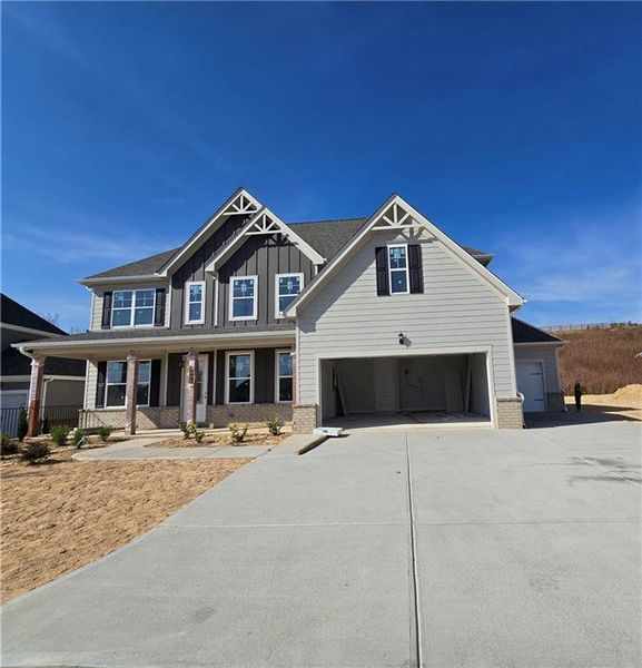 Front exterior of a new home in The Manor at Gainesville Township, Gainesville, GA, highlighting curb appeal (Image 2).