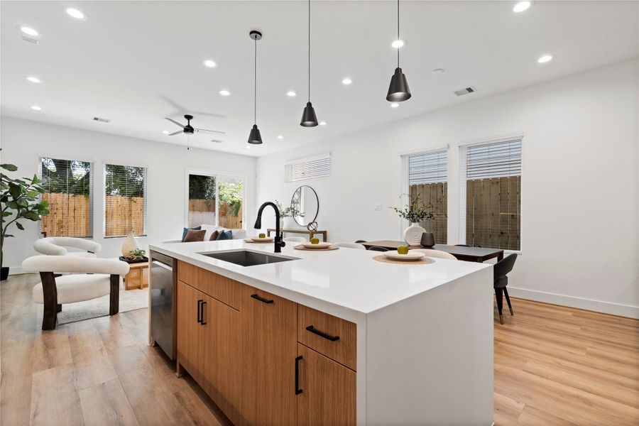 Windows thoughtfully placed around the living area flood the space with natural light, enhancing the open and airy atmosphere Windows thoughtfully placed around the living area flood the space with natural light, enhancing the open and airy atmosphere