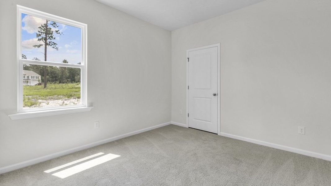 Spacious, unfurnished interior of a new home in Villa Grande, Winterville (Image 25).