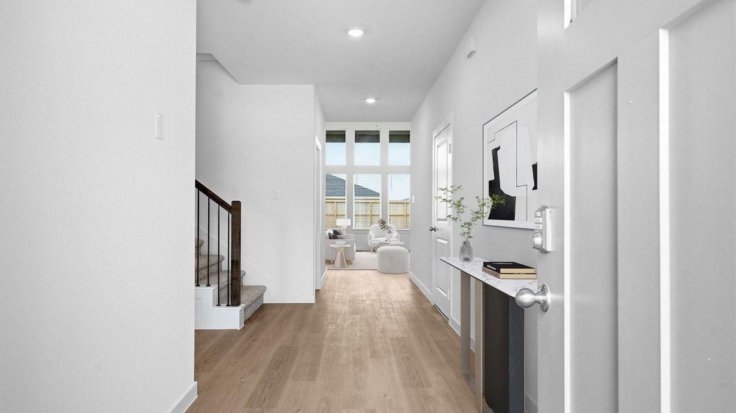 Large fenced-in backyard with a covered patio, perfect for outdoor entertaining.