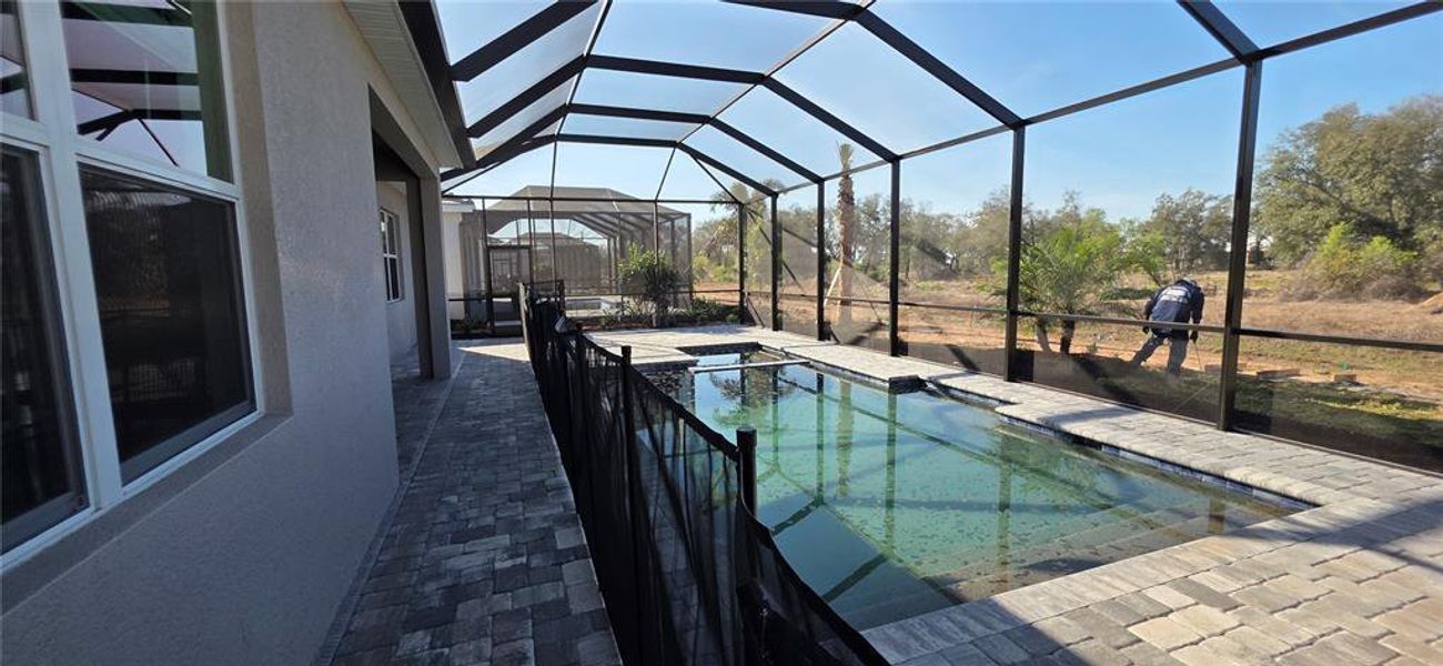 Exterior details and patio area of a home in Calusa Country Club, Lakewood Ranch (Image 4).